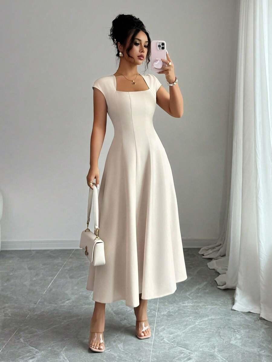 'Romi' Dress | Timeless elegance in a perfect midi cut