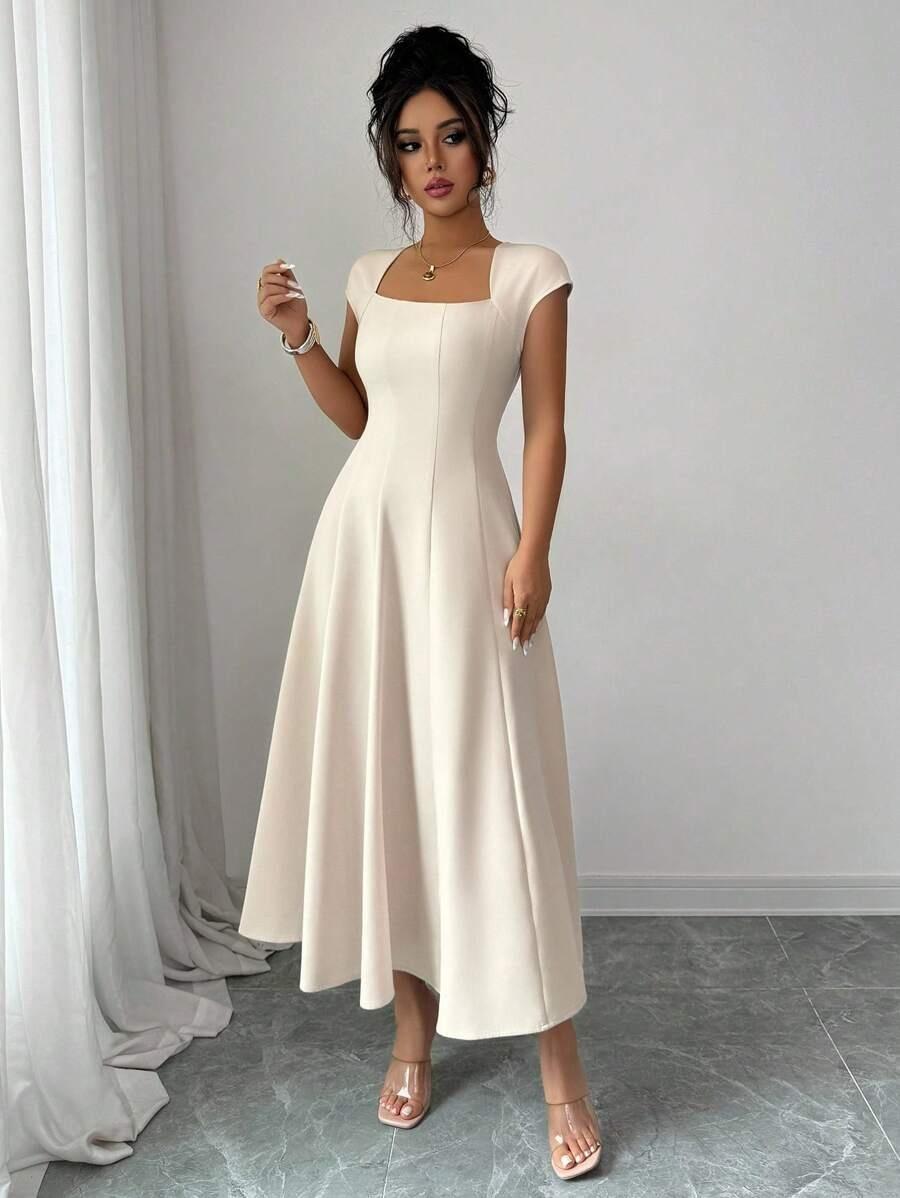 'Romi' Dress | Timeless elegance in a perfect midi cut